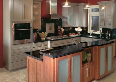 This renovated kitchen delivers bold contemporary flair with sleek contrasts and striking modern finishes.